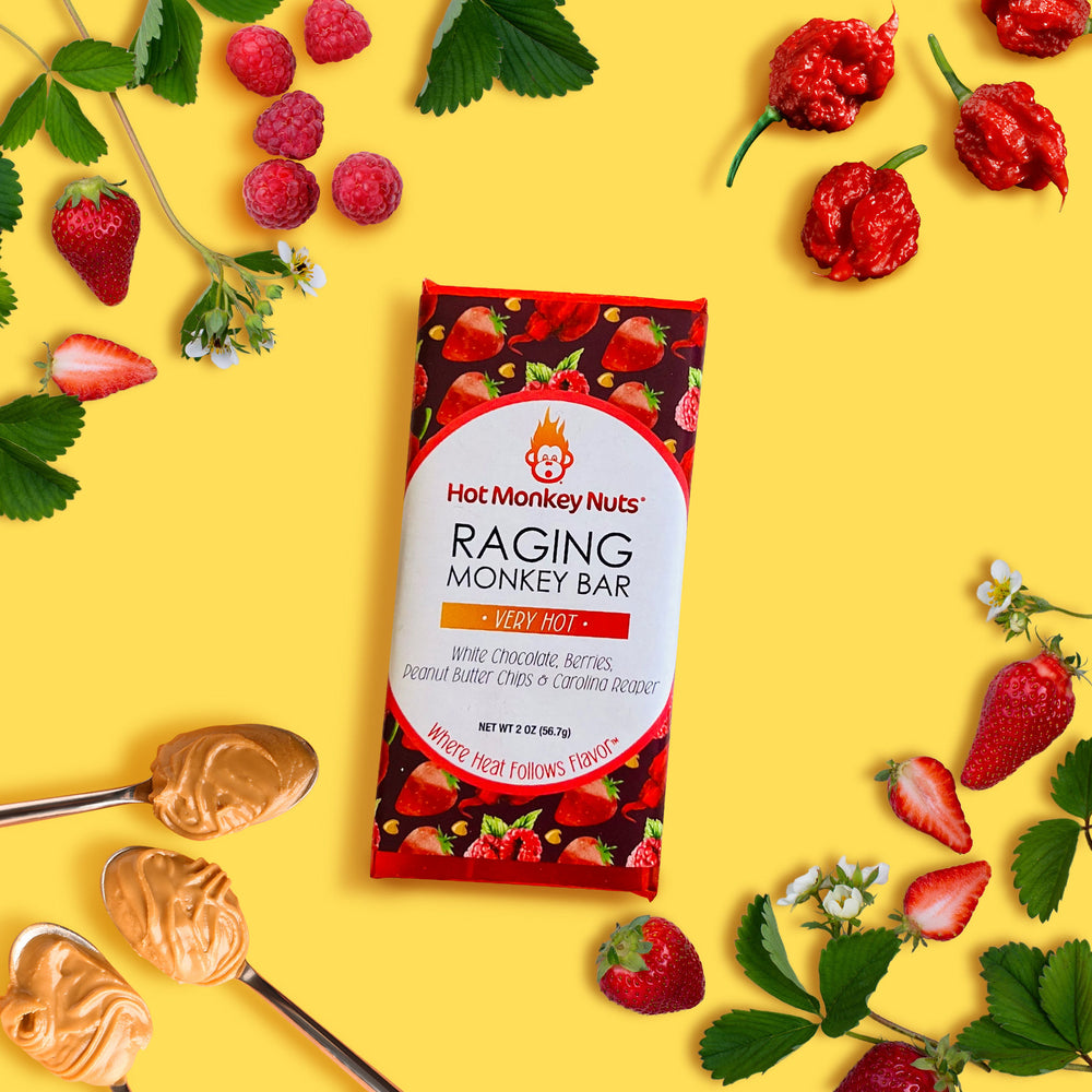 Our Raging spicy chocolate bar is made with White chocolate, berries, peanut butter chips, and Carolina Reaper